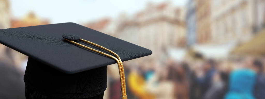 Student wearing mortarboard.